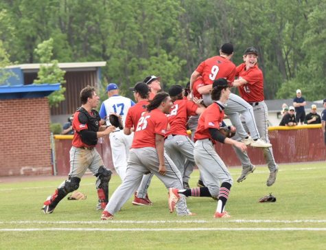 Boys baseball celebrating after winning districts finals against Notre Dame Green Pond. The team eventually went on to lose in the semifinals of states. 