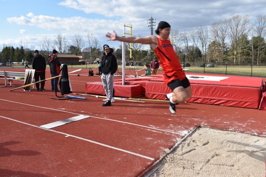 Sophomore Josiah Hernandez participating in the long jump. (Photo Credit: Saucon Valley Yearbook)