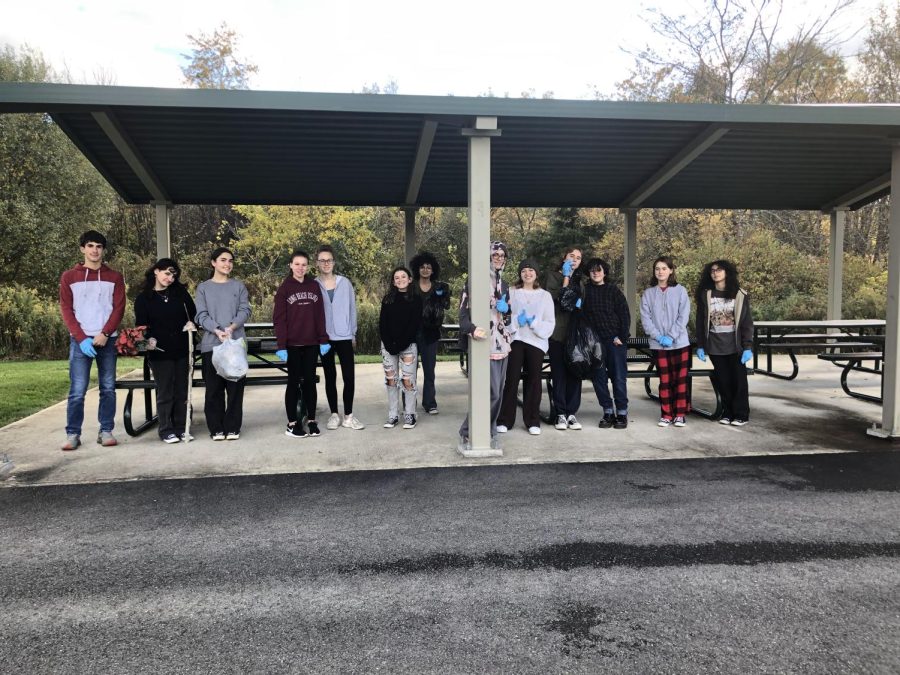 The Environmental Club pictured while they pick up trash off the trail.  The club hosts many events throughout the year to benefit both the community and the district.