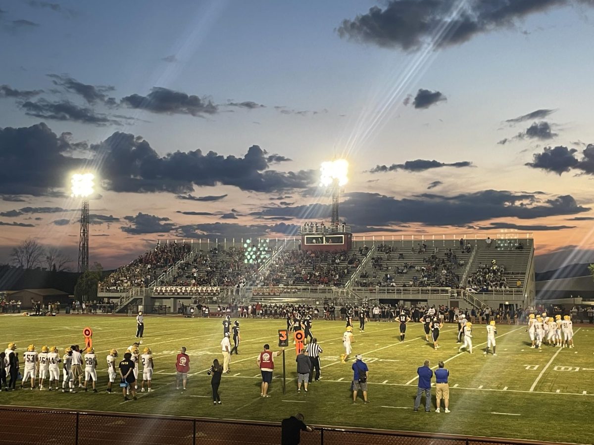 Friday Night lights of the Saucon Valley vs. Wilson football game. The student section, all the way to left of the photo, is an essential support for a team during games.  