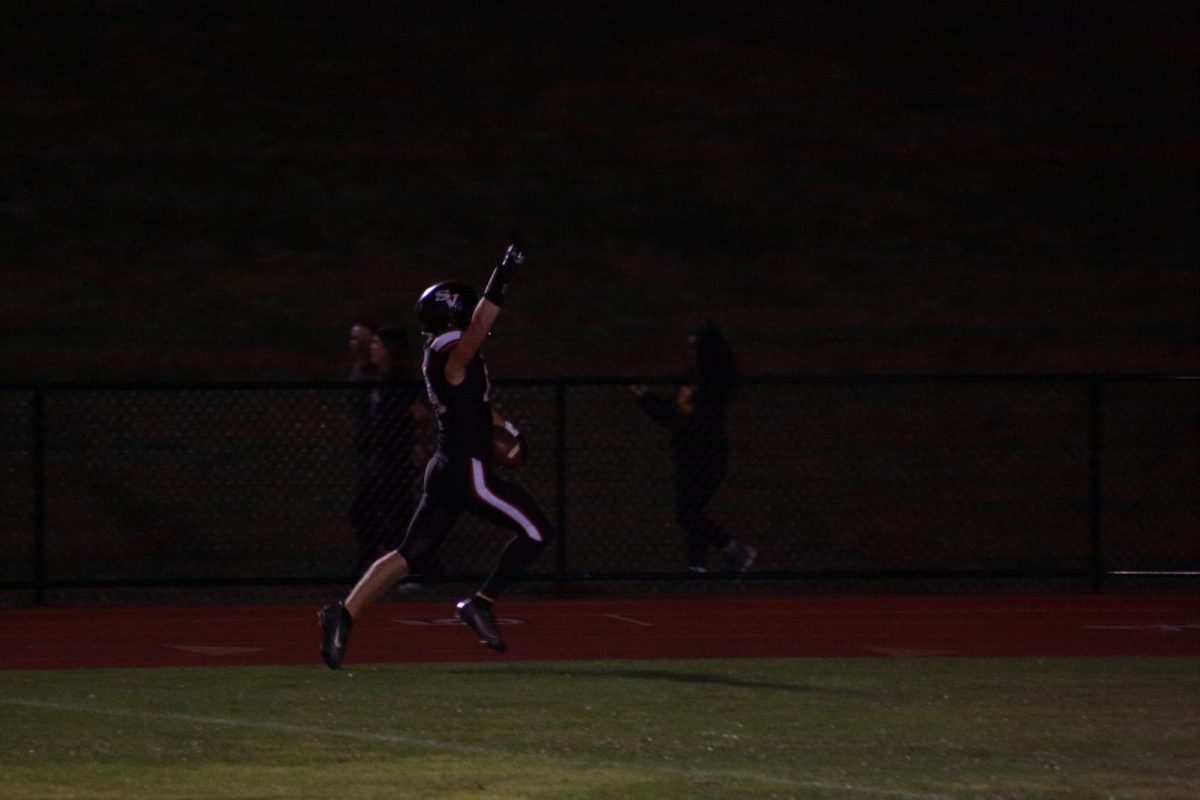 Senior Jack Robinson scores another touch down this homecoming game.