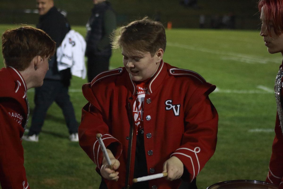 Senior Nick Porterfield preforming his infamous solo during homecoming game. 