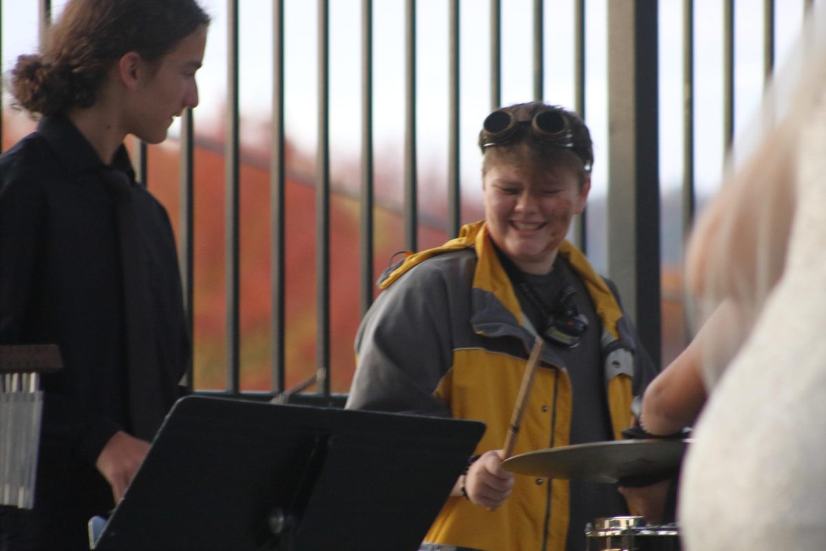 Senior Nick Porterfield sheredding it on the drums during the October Halloween Festival at Dimmick Park.