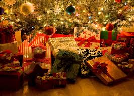 A picture of presents under the tree often opened on either Christmas Eve or Christmas Day. 