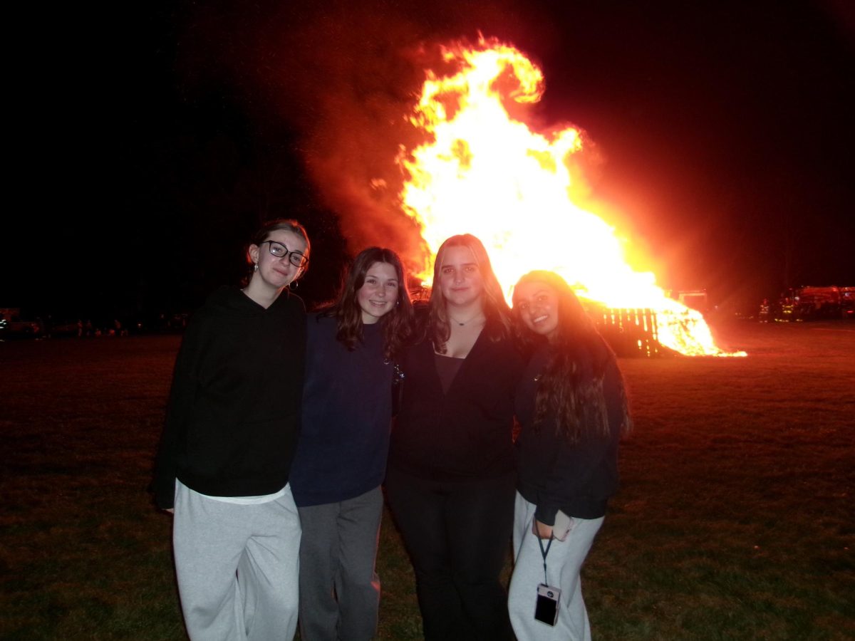 Seniors Kira Young, Logan Matthew’s, Jerzie Phillips, and Laiba Chaudhry at their senior year bonfire.
