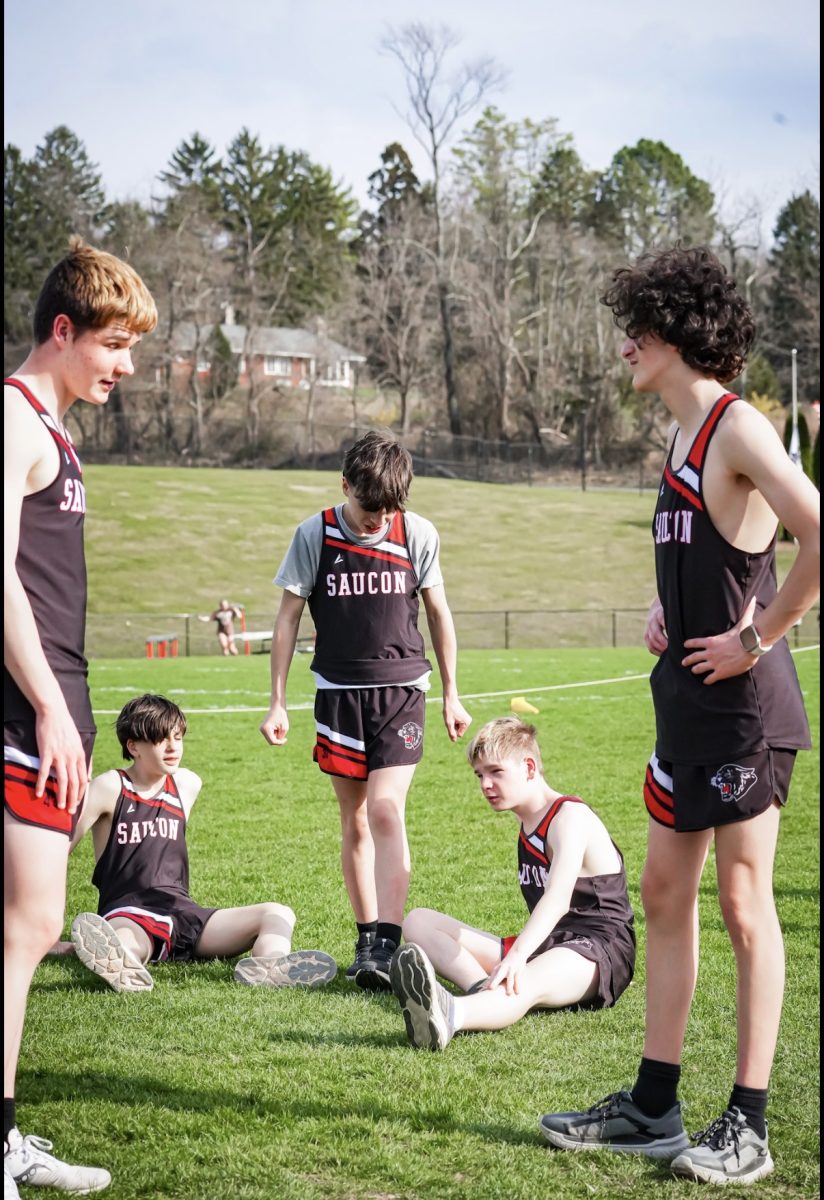 Track athletes at the meet conversing 