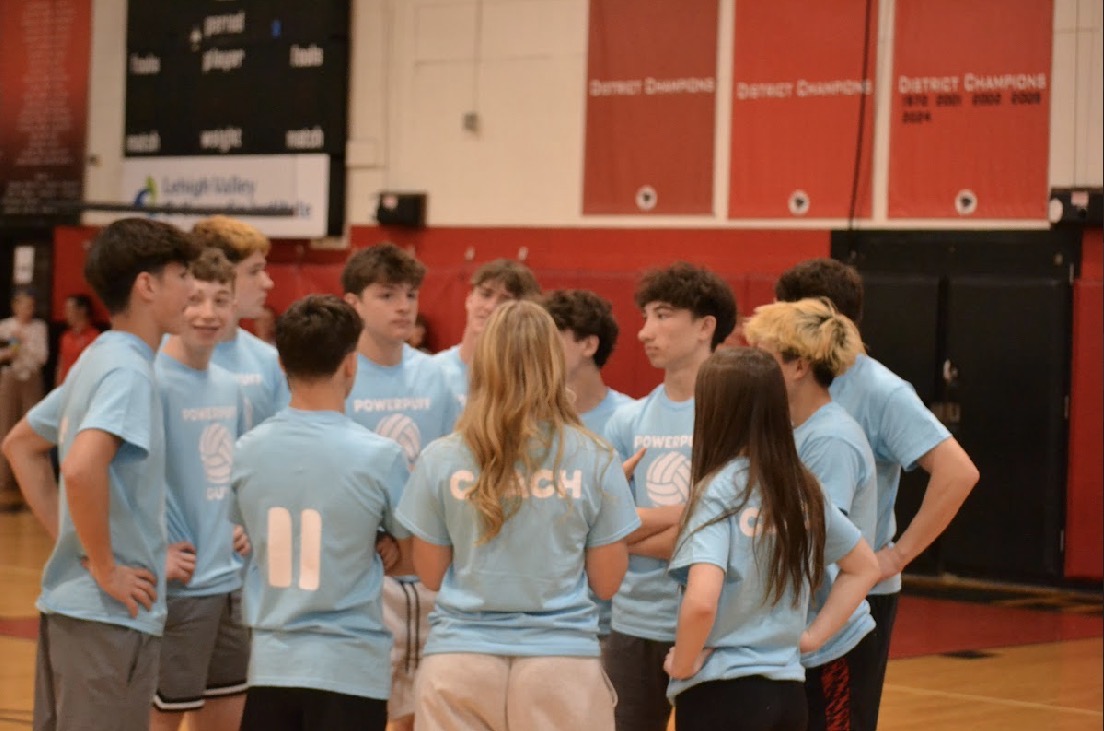 A team meeting during the volleyball game.